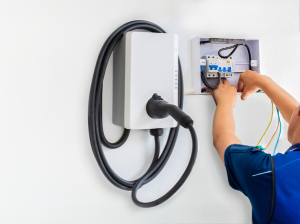 Electric car charger installation technician